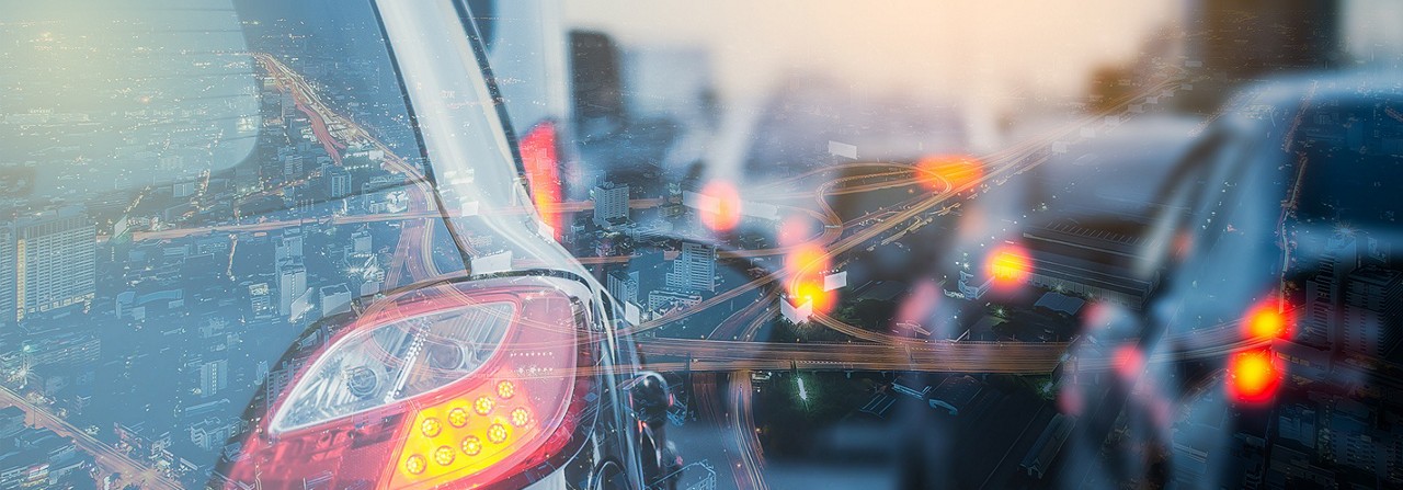 image of car with an overlay of city image and highways